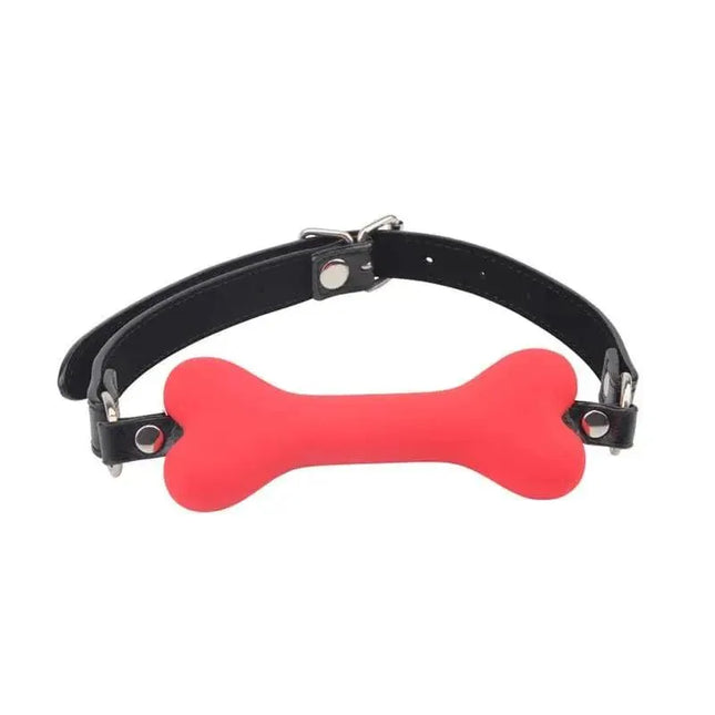 Red silicone bone-shaped ball gag from Kit Serve Me Silicone for adult consensual play.