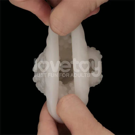 Close-up of Knights Ring Vibrating Dual Purpose Sleeve Drip showing texture and design for enhanced stimulation.