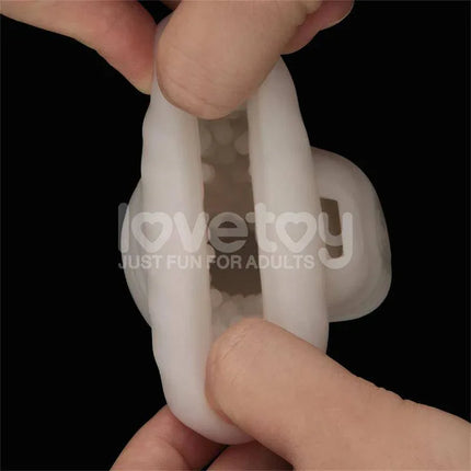 Close-up of Knights Ring Vibrating Dual Purpose Sleeve Wavy showcasing its versatile design and texture for enhanced pleasure.