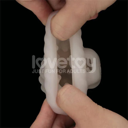 Knights Ring Vibrating Dual Purpose Sleeve in white silicone, showcasing dual-function design for enhanced pleasure.