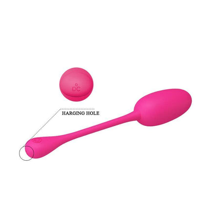 Knucker Silicone Vibrating Egg with 12 Modes in pink, showing charging hole and detachable wireless controller.