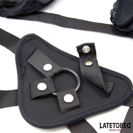 Lace Edge Strap On with Silicone Ring in black featuring adjustable harness for secure fit and enhanced intimacy.