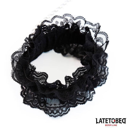 Black lace elastic wrist restraints from LATETOBED, elegant BDSM accessory perfect for light bondage. Lace Elastic Wrist Restraints Black.