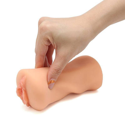 Hand holding Laura Jenner Realistic Male Masturbator Vagina, showcasing its lifelike design and silky smooth texture.