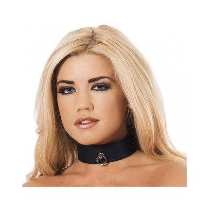 Model wearing a Leather Collar with Ring in black, showcasing the adjustable fit and bold design for stylish versatility.