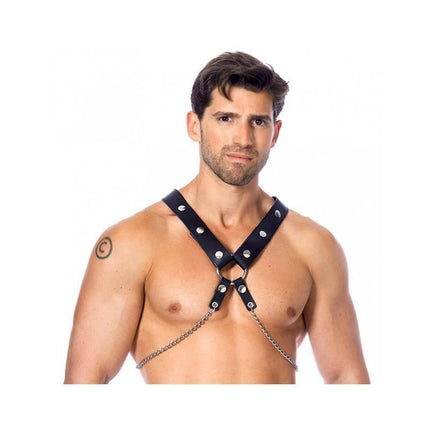 Model wearing Leather Harness with Chains featuring crossed leather and metal details, ideal for bold fashion statements.