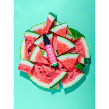 Lick Me Watermelon Kissable Gel with Warm Effect 50 ml amid fresh watermelon slices