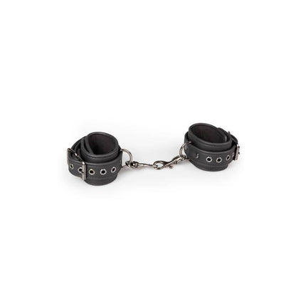 Black leather handcuffs from Ligature Set Neck and Wrist Restraint with chain link detail, foam interior for comfort.
