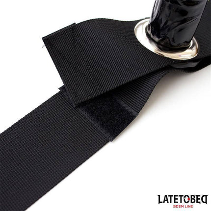 Close-up of Little Penis Adjustable Leg Black showcasing its black strap and adjustable design.