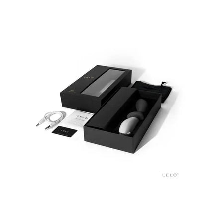 Packaging and contents of LOKI Obsidian Black prostate massager, including vibrator, charging cable, and manual in sleek black boxes.