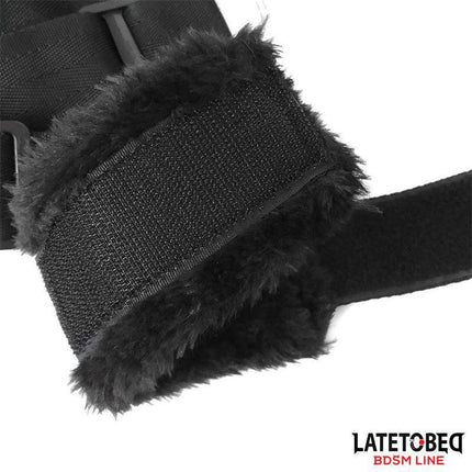 Close-up of Long Velvet Bed Bondage Restraints Adjustable with fluffy velcro handcuffs for secure and comfortable restraint.