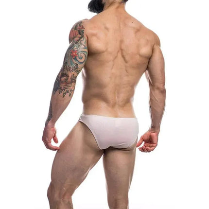 Back view of a man wearing Low Rise Bikini Brief Provocative Nude by Cut4men, showcasing sleek design and fit.