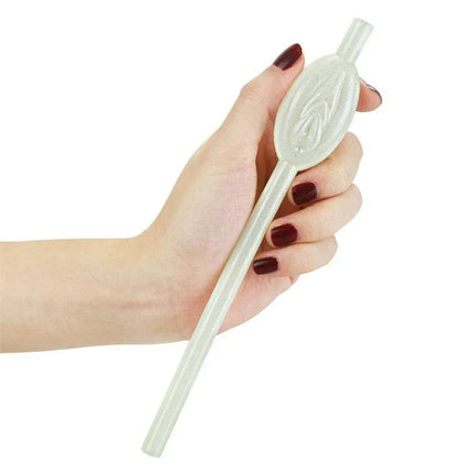 Hand holding a Luminous Vagina Straw from a Pack of 9, glow-in-the-dark design for fun celebrations and parties.