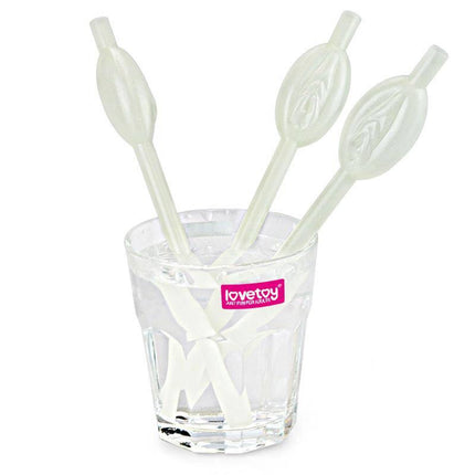 Luminous Vagina Straws Pack of 9 glowing in a glass