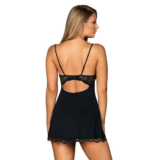 Model wearing Luvae Babydoll and Thong in black, showcasing the back design, made of polyamide and elastane for a flattering silhouette.