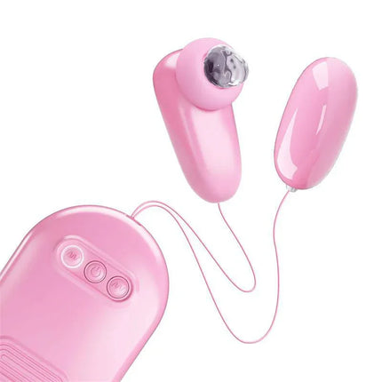 Magic Box Vibrating Egg and Tapping Stimulator with pink design and two-in-one functionality for versatile pleasure experiences