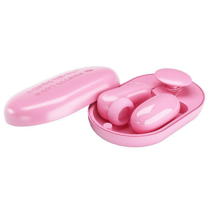 Magic Box Vibrating Egg and Tapping Stimulator in pink case showcasing its two-in-one design for enhanced pleasure.