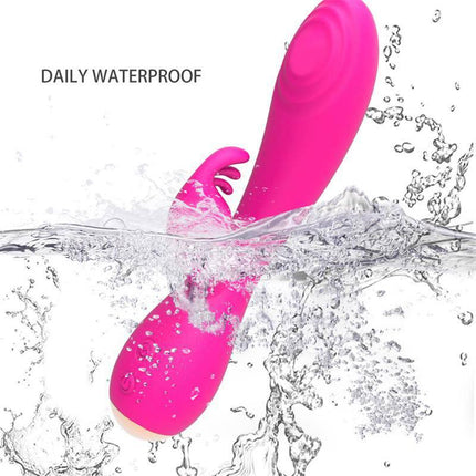 Magic Stick Rabbit Vibe with Pulsation Fuchsia, waterproof silicone vibrator in pink submerged in water showcasing plush form.
