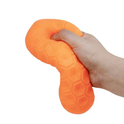 Hand squeezing the Male Masturbator HoneyComb With Internal Balls showcasing its flexibility and honeycomb design texture.