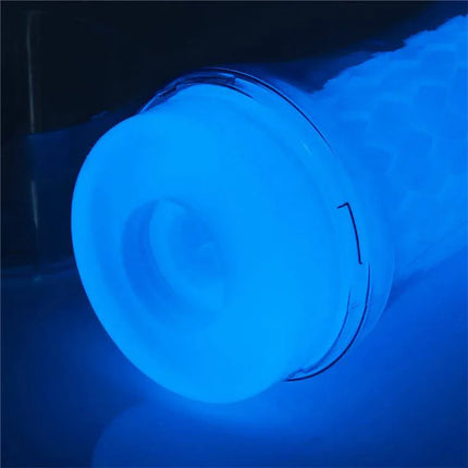 Male Masturbator Lumino Blue Light with glow-on-demand feature illuminating in vivid blue for an enhanced intimate experience.