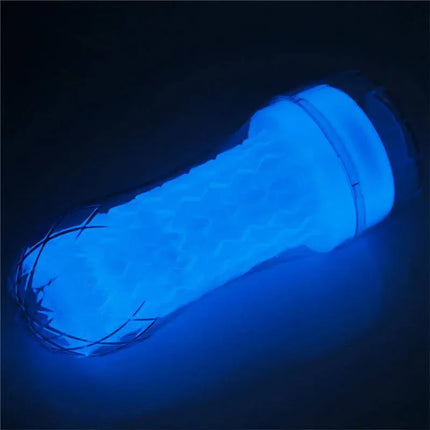 Blue glowing Male Masturbator Lumino Blue Light with unique texture, showcasing its vibrant illumination for playful adult use.