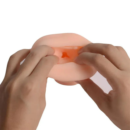 Hands holding the Male Masturbator Vagina Xianger Skin with realistic vaginal opening and textured tunnel for authentic stimulation.