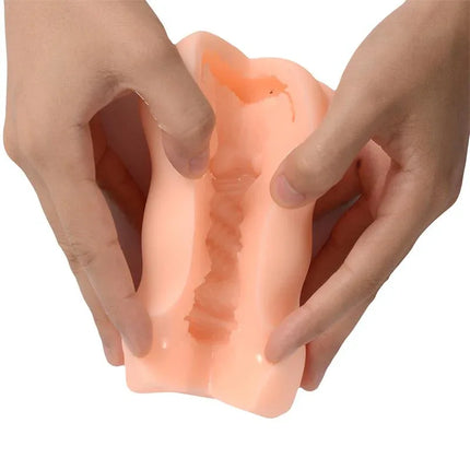 Male Masturbator Vagina Xianger Skin with realistic textured tunnel held in hands