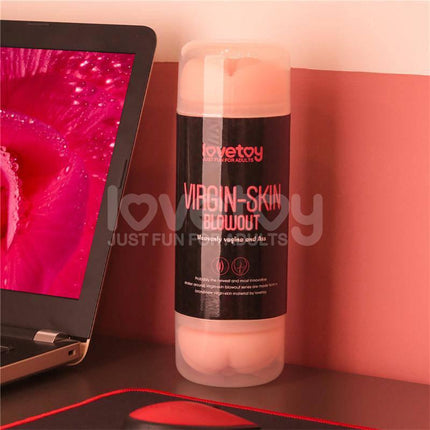 Male Masturbator Virgin-skin Vagina and Anus packaging next to laptop