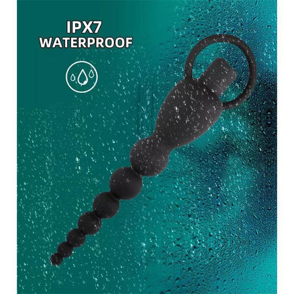 Marbe Anal Chain with Vibration USB Silicone showing waterproof feature in black color on wet surface