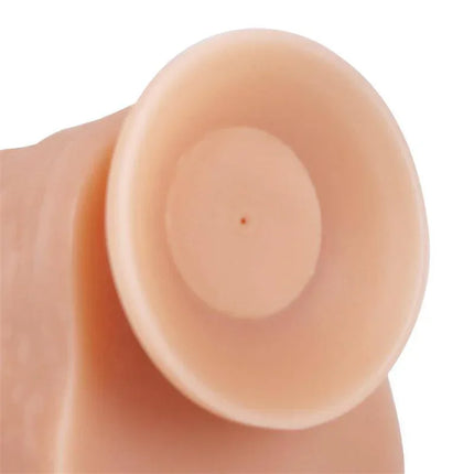 Base of Marcus Realistic Vibrating Dildo with Remote showing lifelike suction cup detail.