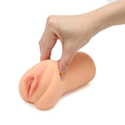 Person holding Marilyn Moore Realistic Male Masturbator Vagina toy, showcasing its realistic design and soft texture.