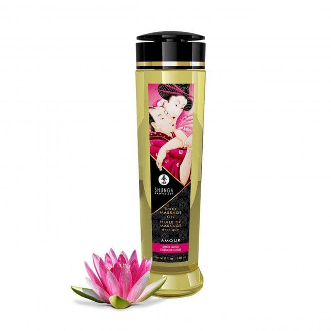 Massage Oil Amour 240 ml bottle with pink lotus, inspired by Japanese erotic art, enriched with vitamin E for nourishing skin care.