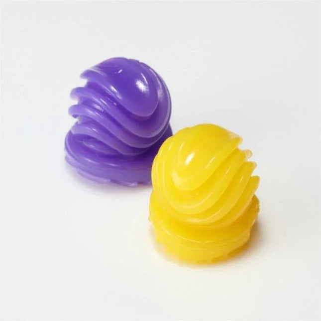 Masturbator Bobble Magic Marbles in purple and yellow, flexible elastomer design for engaging sensations.