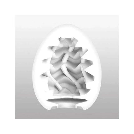 Masturbator Egg Wavy II with wavy textured interior design for intense stimulation and pleasure, made of soft TPE for flexible use.