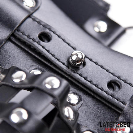 Close-up of locking detail on mens adjustable chastity pants with cage from Latetobed BDSM line