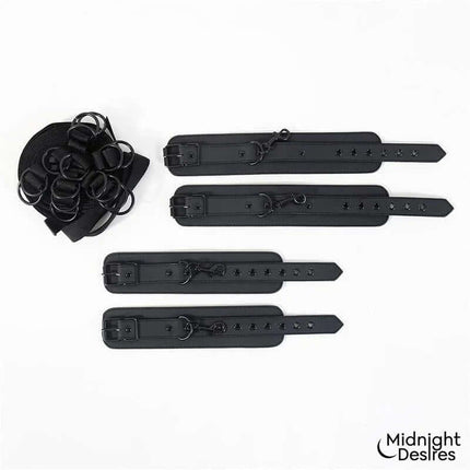 Bed Restraint Set with adjustable vegan leather straps and cuffs for comfort and control in intimate moments.
