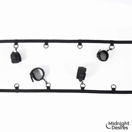 Bed Restraint Set by Midnight Desires featuring adjustable straps and vegan leather cuffs for secure and comfortable use on most beds.