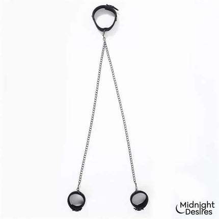 Midnight Desires Collar and Ankle Cuffs with Chain in vegan leather, adjustable buckles, and detachable chain for bondage play.
