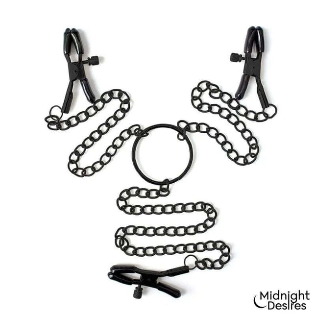 Nipple and Clitoral Clamps by Midnight Desires with adjustable vegan leather chains for adventurous pleasure.