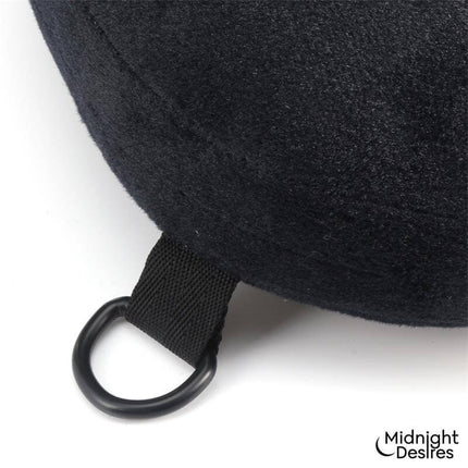 Close-up of the Restraint Set with Neck Pillow highlighting the durable vegan leather and adjustable attachment for secure use.