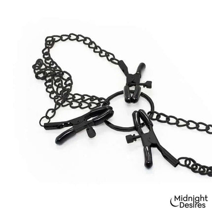 Nipple and Clitoral Clamps by Midnight Desires, featuring adjustable vegan leather designs for enhanced pleasure.