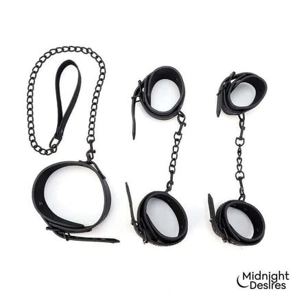 Restraint Set with Collar with Leash and Cuffs in vegan leather, featuring wrist and ankle cuffs, by Midnight Desires.