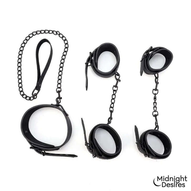 Restraint Set with Collar with Leash and Cuffs in vegan leather, featuring wrist and ankle cuffs, by Midnight Desires.