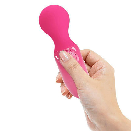 Hand holding Mini Masagger Little Cute USB, a compact pink wand massager with silicone cover and multiple speed settings.