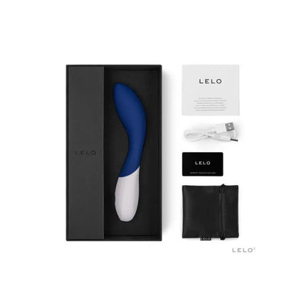 Packaging of MONA WAVE Midnight Blue with contents displayed, including charger and instructions, highlighting its luxurious design.