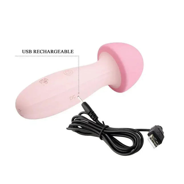 Pink Mushroom Vibe/Massager Silicone USB with USB cable, showcasing the sleek design and USB rechargeability feature.