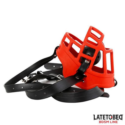 Muzzle with Breathable Gag Ball from Latetobed BDSM Line featuring red exterior and black straps for intense play.