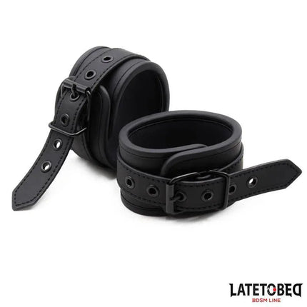 Black Neoprene Handcuffs by LATETOBED for adult intimate moments.
