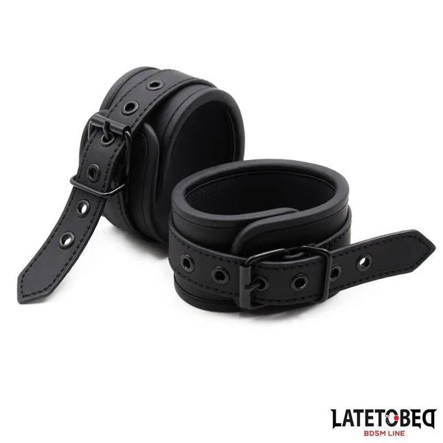 Black Neoprene Handcuffs by LATETOBED for adult intimate moments.