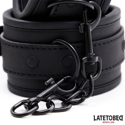 Neoprene Handcuffs Black from LATETOBED with adjustable range, featuring sleek design in durable neoprene for intimate moments.